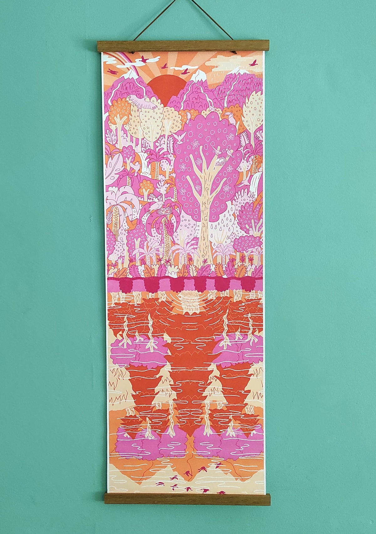 Decorative wall scroll with a colorful nature-themed design on a teal background