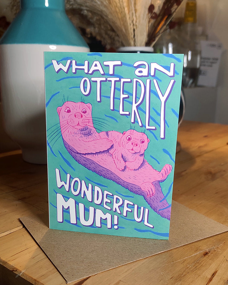 A Mother's Day card featuring an Otter and a baby otter, the text reads 'What an Otterly Wonderful Mum'